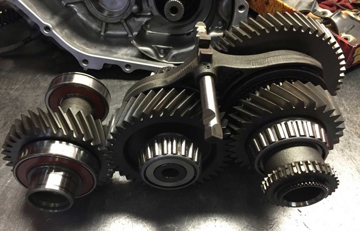 Fabco transfer case gears and shafts on the bench
